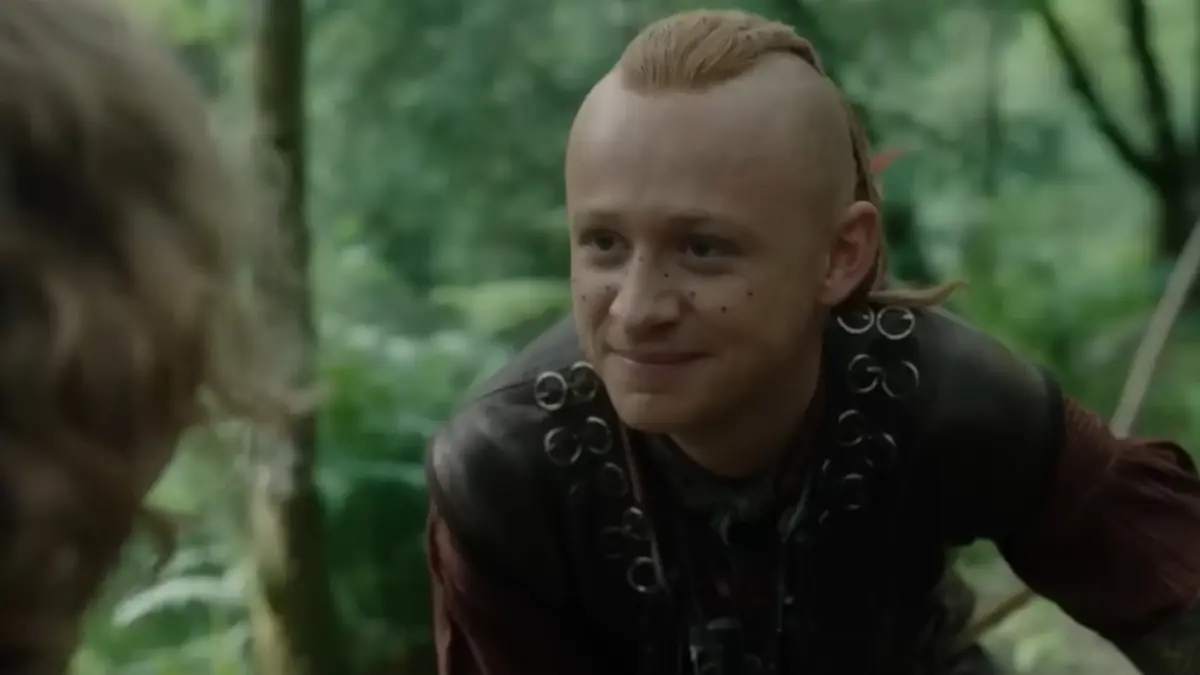 Outlander Season 8 poster featuring Claire and Jamie standing together, symbolizing the epic series finale and upcoming prequel Blood of My Blood.